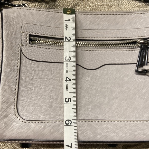 Sale! Rebecca Minkoff light gray crossbody bag with chain strap and tassels. - Picture 14 of 16
